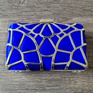 BCBG electric blue clutch purse
